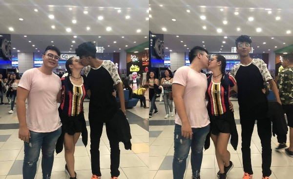 Male Pakistani best friends pose with their mutual girlfriend